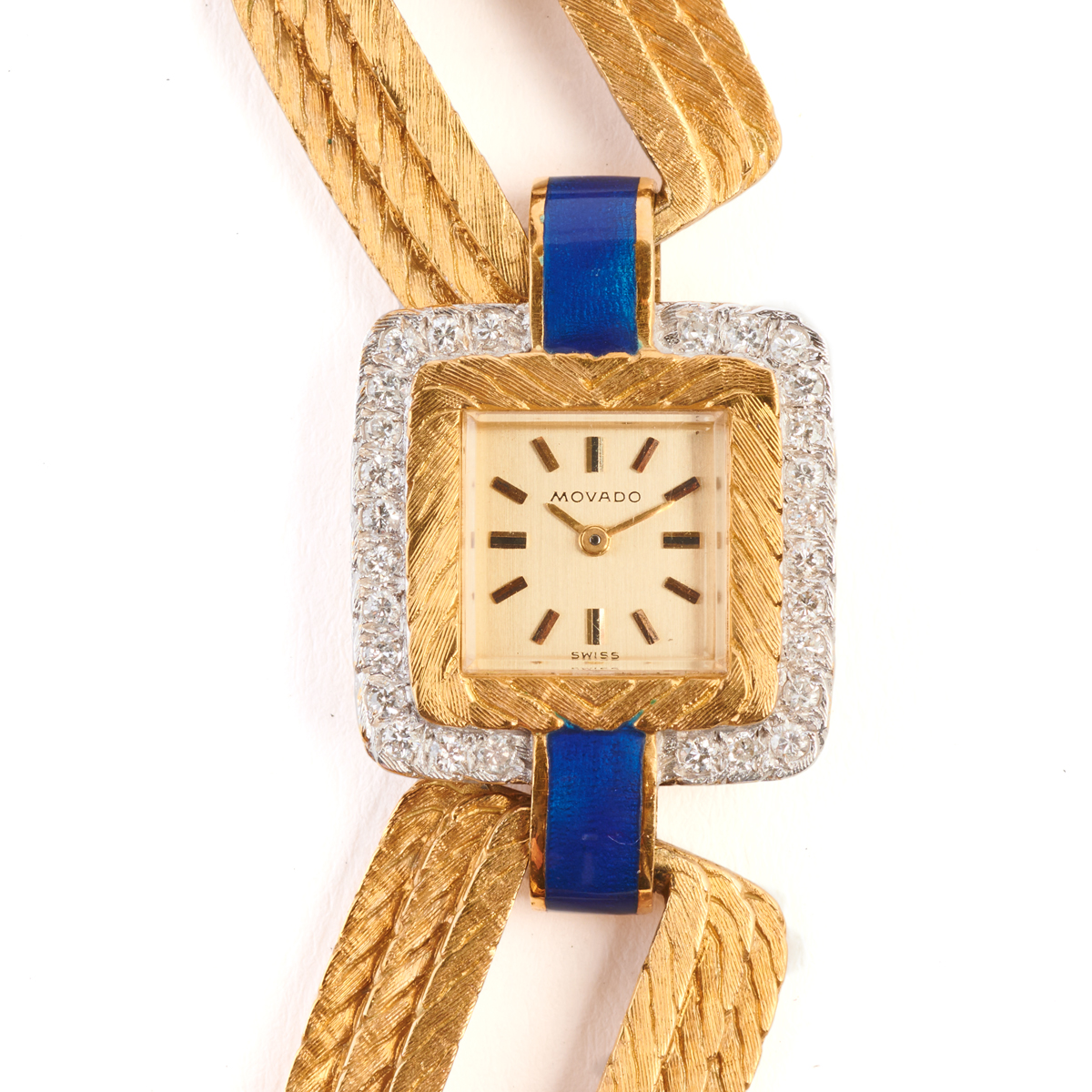 Movado Diamond, Blue Enamel, 18k Yellow Gold Wristwatch. Estimate: $2,500/3,500.