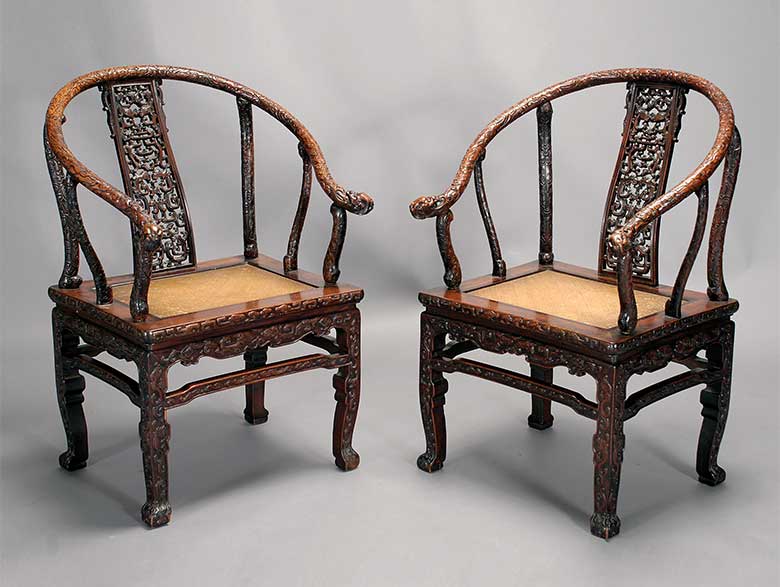 A Pair of Carved Huanghuali and Mixed Wood Horseshoe Chairs, 16th/17th Century Elements